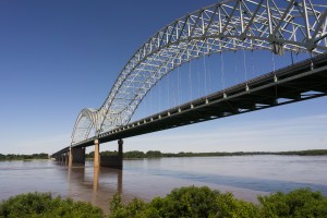 The Mississippi River flows under the Hernando de Soto Bridge looking towards Arkansas