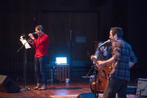 Artists Sam Green, in red, and Brent Green perform live cinema at the 2017 SMBHC Spring Convocation. Photo by Kevin Bain/Ole Miss Communications