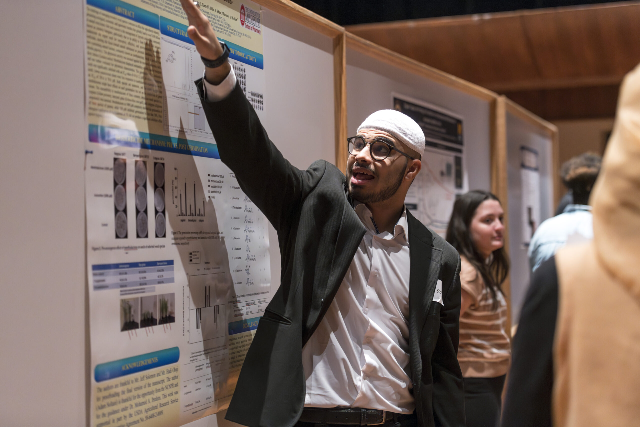 Adam Soltani presents his undergraduate research poster